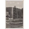 Bad Kudowa - Springbrunnen im Kurpark mit Blick auf den Schloßberg